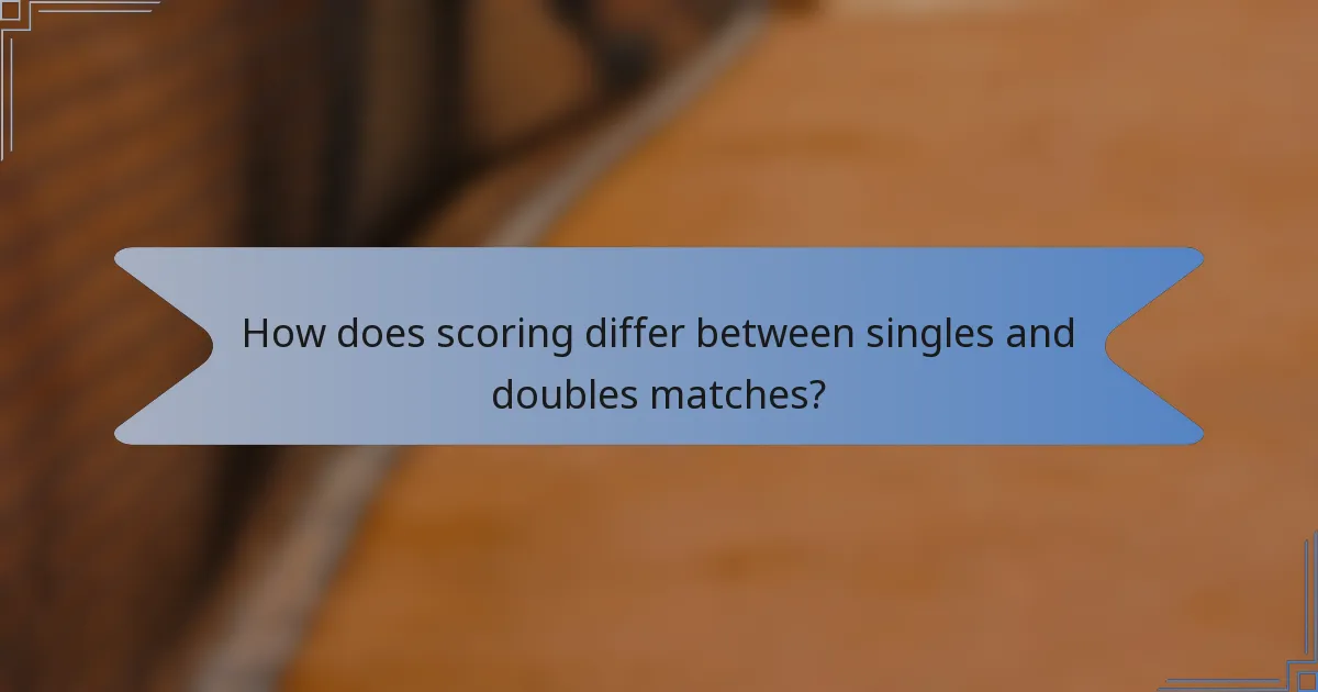 How does scoring differ between singles and doubles matches?